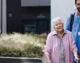 Caregiver and client on a walk