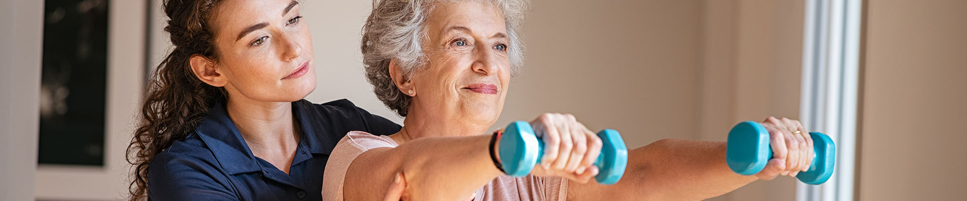 Caregiver assisting with exercises